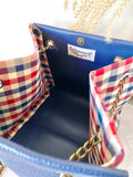 Blue leather button cube bag - red blue checker