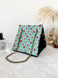 Black canvas button cube bag - green flower tiles