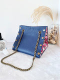 Blue leather button cube bag - red floral