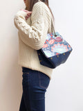 Blue leather button cube bag - blue floral