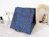 Black textured leather button cube bag - white and pink dots