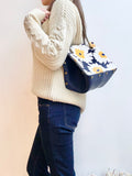 Blue leather button cube bag - blue sunflowers