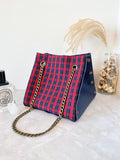 Blue leather button cube bag - red plaid