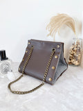 Brown leather button cube bag - woven chevron stripes