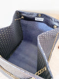 Black textured leather button cube bag - geometric star print
