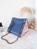 Blue leather button cube bag - red lace
