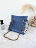 Blue leather button cube bag - blue floral