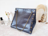 Black textured leather button cube bag - geometric star print