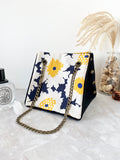 Black canvas button cube bag - yellow sunflowers