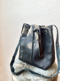 Black leather bucket bag