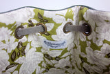 Green leather bucket bag with floral lining