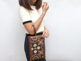 Button clutch