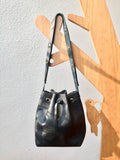 Black leather bucket bag