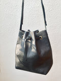 Black leather bucket bag