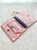 Short travel wallet with customisable leather name tag