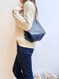 Blue leather button cube bag - woven chevron stripes