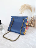 Blue leather button cube bag - yellow sunflowers