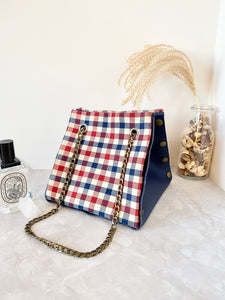 Blue leather button cube bag - red blue checker