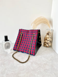 Black textured leather button cube bag - red plaid