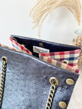 Black textured leather button cube bag - red blue checker