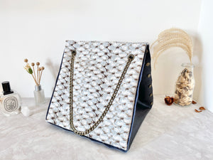 Black textured leather button cube bag - snake skin print