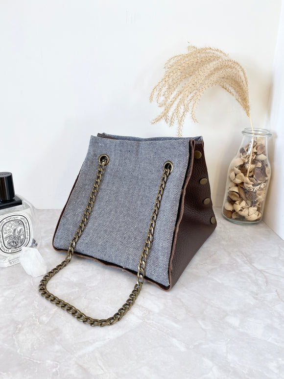 Brown leather button cube bag - woven chevron stripes