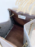 Brown leather button cube bag - woven chevron stripes
