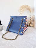 Blue leather button cube bag - red blue checker