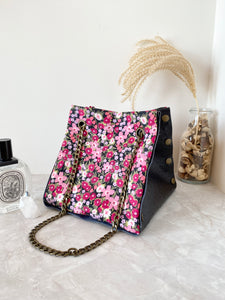 Black textured leather button cube bag - red floral