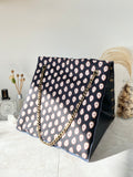 Black textured leather button cube bag - paisley print