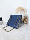 Blue leather button cube bag - woven chevron stripes